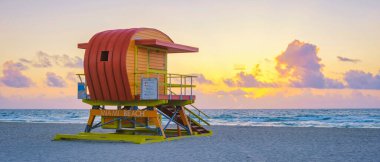 Lifeguard hut on the beach in Miami Florida, colorful hut on the beach during sunrise Miami South Beach. Sunny day on the beach