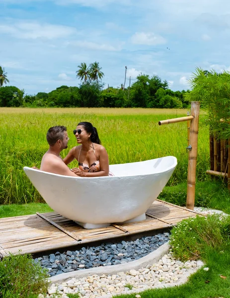 Couple Men Women White Bathtub Looking Out Green Rice Field — Photo