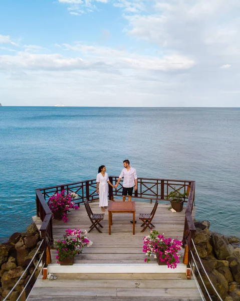 Young Couple Vacation Saint Lucia Relaxing Wooden Pier Ocean Luxury — Stok fotoğraf