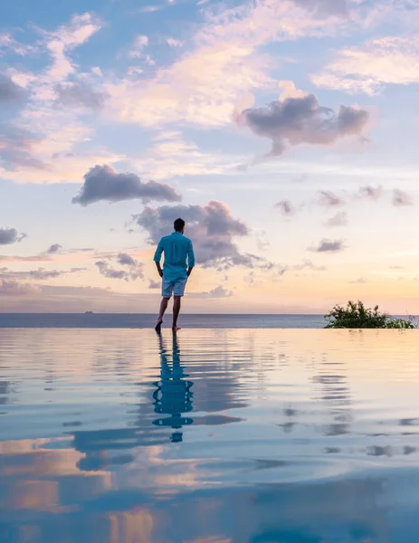 Young Men Watching Sunset Reflection Pool Saint Lucia Caribbean Men — 스톡 사진