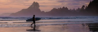 Tofino Vancouver Island Pacific rim coast, surfers with surfboard during sunset at the beach, surfers silhouette Canada Vancouver Island Tofino Vancouver Islander Island 