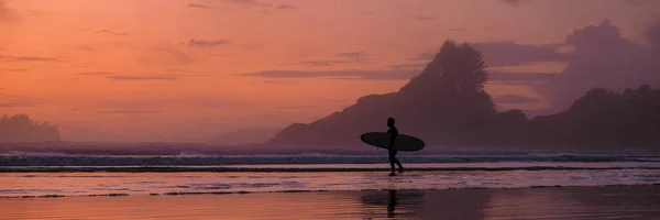 Tofino Vancouver Island Pacific rim coast, surfers with surfboard during sunset at the beach, surfers silhouette Canada Vancouver Island Tofino Vancouver Islander Island