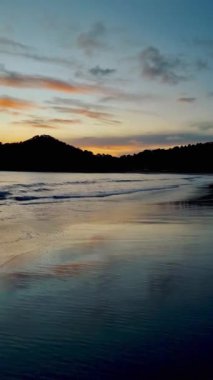 sunset on the tropical beach of Koh Lanta Thailand during a vacation in Thailand. Koh Lanta Island Thailand