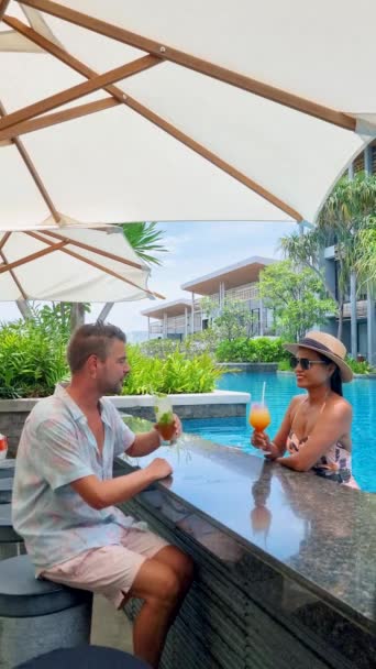Couple Men Women Drinking Cocktails Bar Tropical Pool Vacation Asian — Video Stock