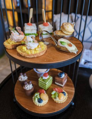 Luxury high tea with snacks and tea in a luxury hotel