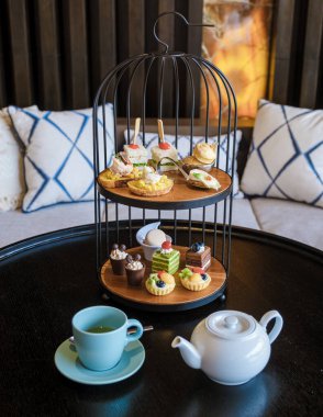 Luxury high tea with snacks and tea in a luxury hotel