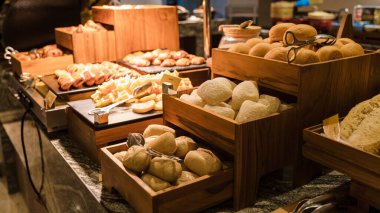 Breakfast buffet in a luxury hotel. bread corner with croissant muffin and chocolate bread at the bread buffet