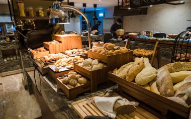 Breakfast buffet in a luxury hotel. bread corner with croissant muffin and chocolate bread at the bread buffet