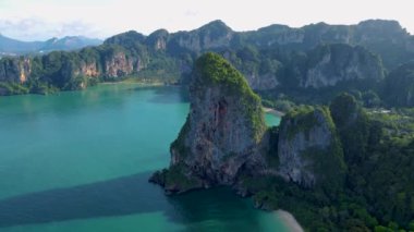Railay Beach Krabi Thailand, the tropical beach of Railay Krabi, panoramic view of idyllic Railay Beach in Thailand with huge limestone rocks 
