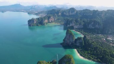 Railay Beach Krabi Thailand, the tropical beach of Railay Krabi, panoramic view of idyllic Railay Beach in Thailand with huge limestone rocks 