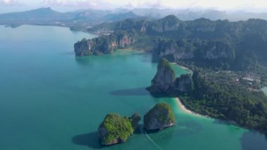 Railay Beach Krabi Thailand, the tropical beach of Railay Krabi, panoramic view of idyllic Railay Beach in Thailand with huge limestone rocks 
