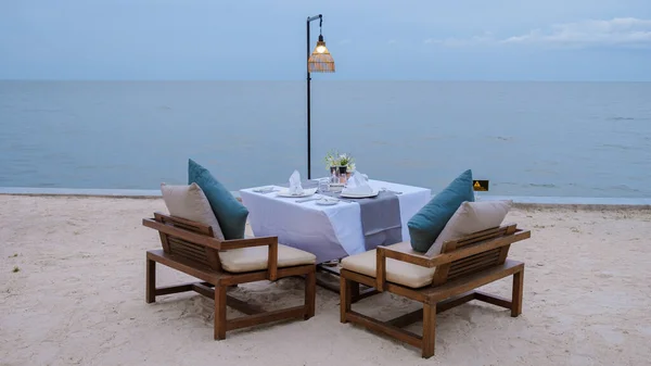 Romantic dinner table by the ocean in Hua Hin Thailand