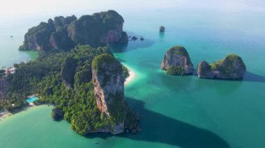Railay Beach Krabi Thailand, the tropical beach of Railay Krabi, panoramic view of idyllic Railay Beach in Thailand with huge limestone rocks 