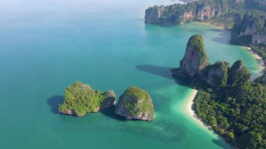 Railay Beach Krabi Thailand, the tropical beach of Railay Krabi, panoramic view of idyllic Railay Beach in Thailand with huge limestone rocks 