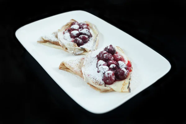 Pancakes with cherry — Stock Photo, Image