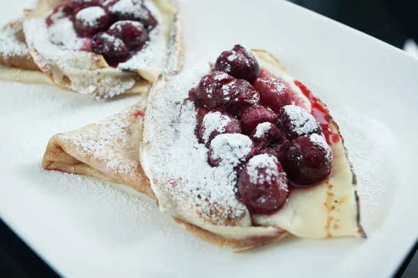 Pancakes with cherry — Stock Photo, Image