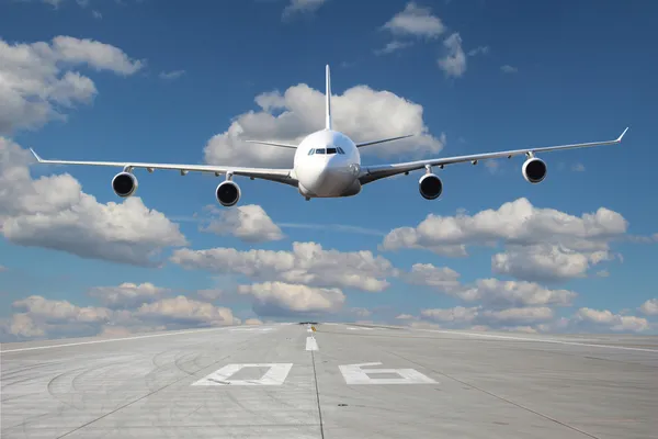 Low pass of white plane — Stock Photo, Image