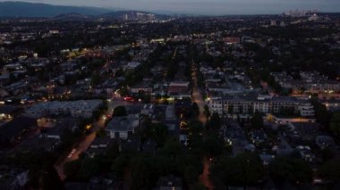 Aerial view of canadian residential area at twilight with illuminated streets