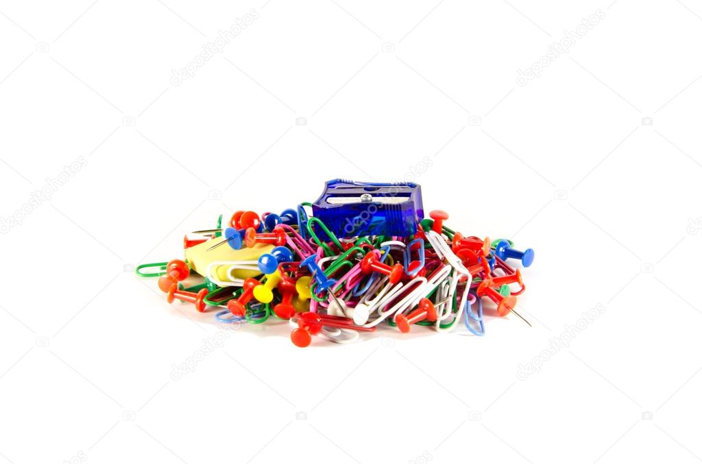 Paper clips, pins, eraser, pencil sharpener