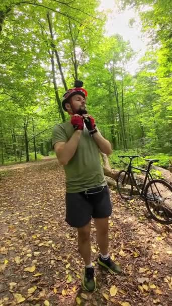 Man Fastening Bicycle Protective Helmet Action Camera His Head Bicycle — ストック動画