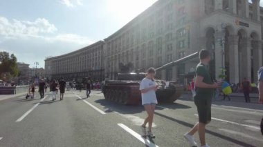 Kyiv, Ukraine - August 24, 2022: Independence Day on Kiev's central street Khreshchatyk. People inspect Russian equipment on display for a symbolic parade of the Russian army in Ukraine. 