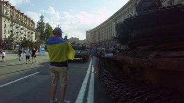 Kyiv, Ukraine - August 24, 2022: Independence Day on Kiev's central street Khreshchatyk. People inspect Russian equipment on display for a symbolic parade of the Russian army in Ukraine. 