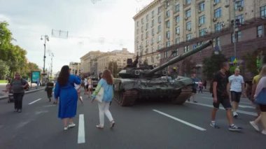 Kyiv, Ukraine - August 24, 2022: Independence Day on Kiev's central street Khreshchatyk. People inspect Russian equipment on display for a symbolic parade of the Russian army in Ukraine. 