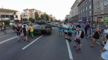 Kyiv, Ukraine - August 24, 2022: Independence Day on Kiev's central street Khreshchatyk. People inspect Russian equipment on display for a symbolic parade of the Russian army in Ukraine. 
