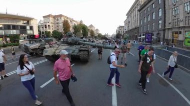 Kyiv, Ukraine - August 24, 2022: Independence Day on Kiev's central street Khreshchatyk. People inspect Russian equipment on display for a symbolic parade of the Russian army in Ukraine.