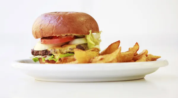 Großer Cheeseburger Stockbild