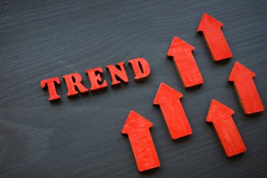 Modern trend kelimesi ve yükselen kırmızı oklar.
