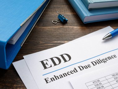 EDD enhanced due diligence papers and blue folder. clipart