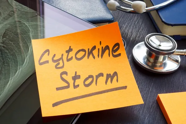 Cytokine storm memo sticker on the hospital table. — Stock Photo, Image