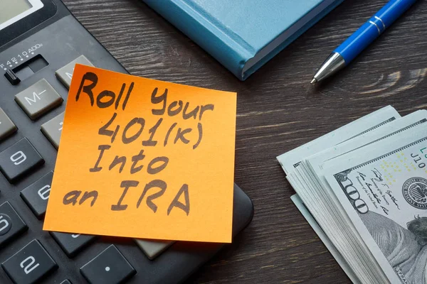 Phrase roll your 401k into an IRA on the sticker. — Stock Photo, Image