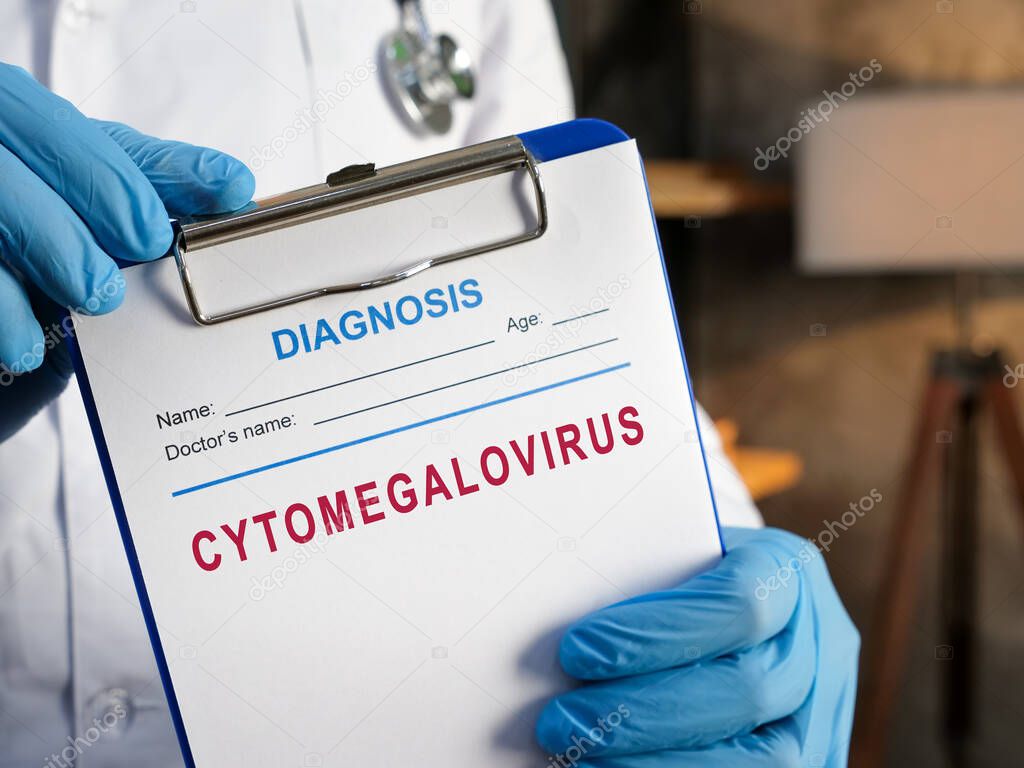 Doctor and cytomegalovirus diagnosis on the medical form.