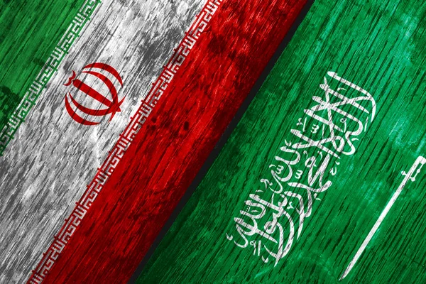 Flags of Iran and Saudi Arabia on the boards. — Stockfoto