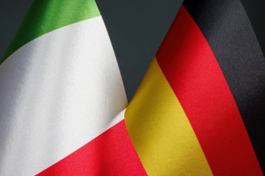 Flags of Italy and Germany as symbol of diplomacy.