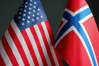 Closeup of the Norwegian and American flags side by side.
