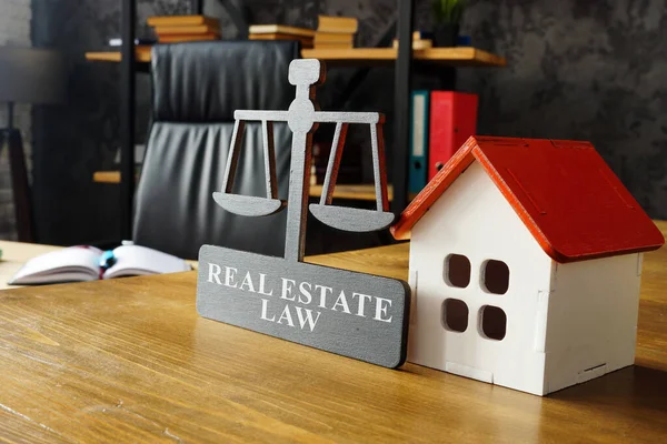 A Model of house and real estate law plate.