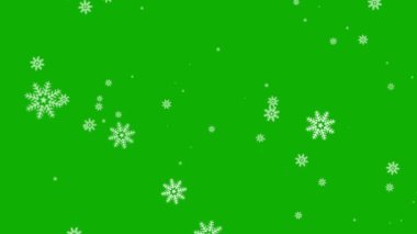 Yeşil ekran arka planına sahip kar tanecikleri hareket ettirir