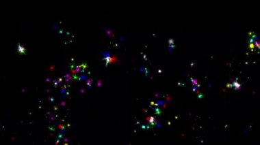 Colorful twinkling sparks motion graphics with night background