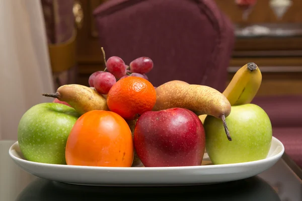 Sweet fresh fruits on plate — Stock Photo, Image
