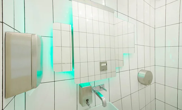 White bathroom with aqua backlight — Stock Photo, Image