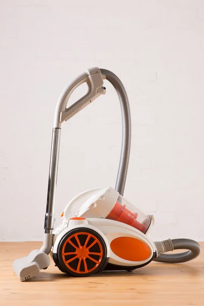 Vacuum cleaner stands in the home — Stock Photo, Image