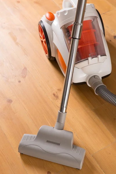 Vacuum cleaner stands in the home — Stock Photo, Image