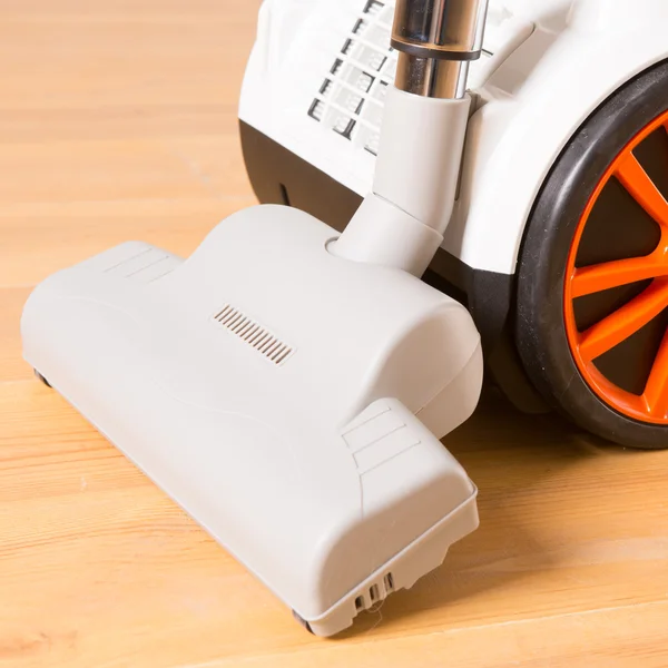 Vacuum cleaner stands in the home — Stock Photo, Image