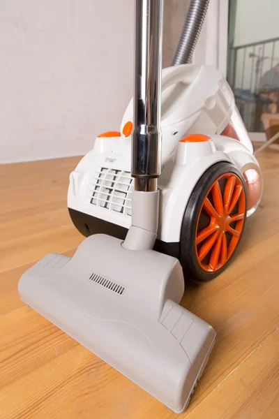 Vacuum cleaner stands in the home — Stock Photo, Image