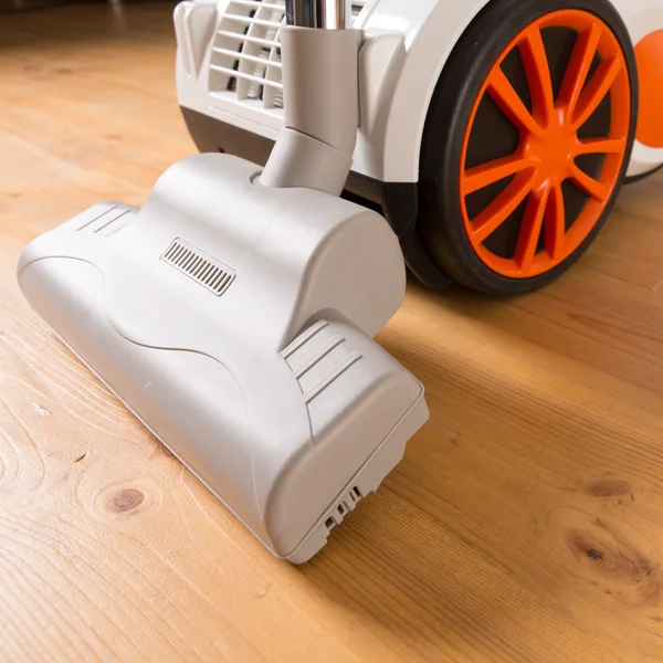 Vacuum cleaner stands in the home — Stock Photo, Image