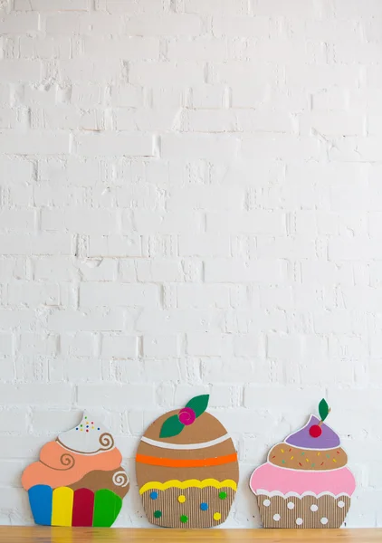 Colored cakes handmade of paper on white background — Stock Photo, Image