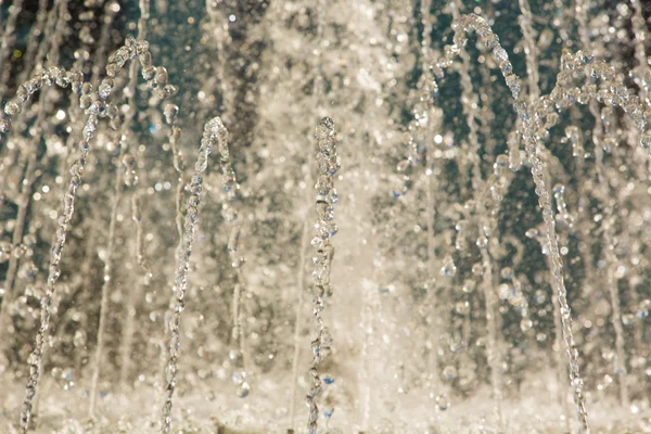 Wasserspritzer im Brunnen, abstraktes Bild. — Stockfoto